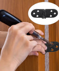 Installation of Four Pack Folding Flip Top Hinges In Zinc Alloy Black for doors and cabinets with a screwdriver.