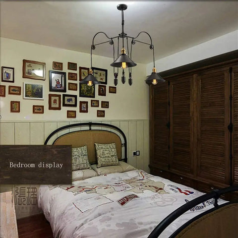 Kick Up Your Style With Adjustable Height Retractable Pulley System Vintage Black Metal Chandelier Ceiling Lamp Kitchen Bar Rack Built Tough Real Deal Quality hanging above a bed in a cozy bedroom.