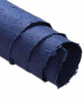 Close-up of rolled Colored Floral Bouquet Wrapping Paper Sheets 25 By 37 Inch Gift Wrap in navy blue, showing texture.