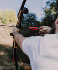 Archer using Beefed Up 30 Inch Carbon Hunting Arrows With Real Turkey Feather Fletching And Removable Tips, 100 Grain Arrowheads, 500 Spine