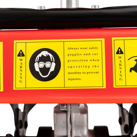 Safety warning label on 52CC Gas Powered Tiller Cultivator with 2 Stroke Engine, highlighting need for goggles and ear protection.