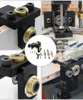 Dead Center Woodwork Punching Locator Tool For Carpentry Marking And Drawing Solid Aluminum Alloy Manual Drilling Positioner close-up view showing compact design and attachment to wood.