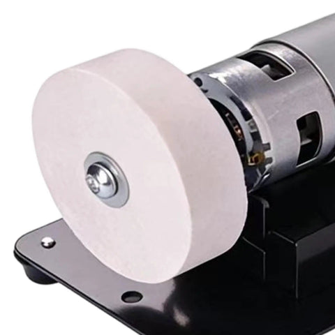 Mini Bench Grinder With Powerful 100 Watt Brushless Motor Delivers Tough As Nails Sharpening For Metal Wood And Diy Crafting Projects, showing the grinding wheel.