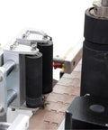 WZLOIUNHZ Automatic Positioning Labeler For Round Bottles Cans Jars Servo Control Smooth Wrap With 10 To 180 Mm Height Range Professional Precision Application Machine close-up of rollers and mechanism.