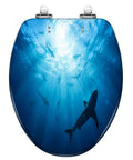 Elongated Silhouettes sharks underwater ocean against bright Toilet Seat with vibrant blue design and sturdy construction.