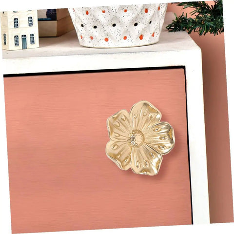 Brass Flower Cabinet Handles Set For Wardrobe And Dresser, Vintage Style Drawer Knobs with floral design on pink drawer