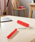 Knockout 2 Piece Wood Grain Texture Paint Roller Pair Featuring Rock Solid Grip Handle For Quick Drywall Mud Work and Real Deal Fake Timber Finish Results That Truly Stand Out on table.
