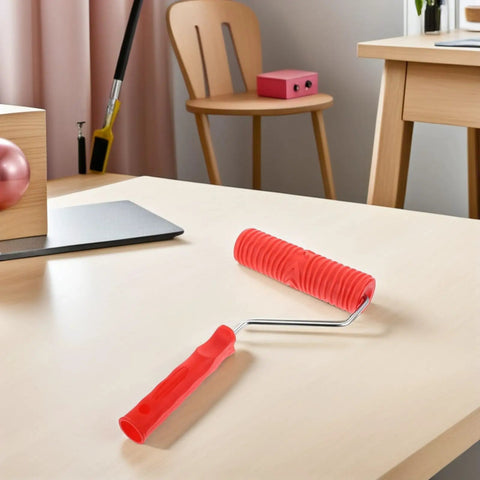 Knockout 2 Piece Wood Grain Texture Paint Roller Pair Featuring Rock Solid Grip Handle For Quick Drywall Mud Work and Real Deal Fake Timber Finish Results That Truly Stand Out on table.