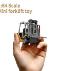 Mini One Sixty Fourth Scale RC Forklift Toy With 2 In 1 Transformable Lift Fork And Hook Remote Control Truck in hand