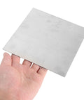 Top Shelf Stainless Steel Square Sheets 2 Pack 15X15X0.08Cm Sleek Mill Finish Solid Flat Stock held in hand.