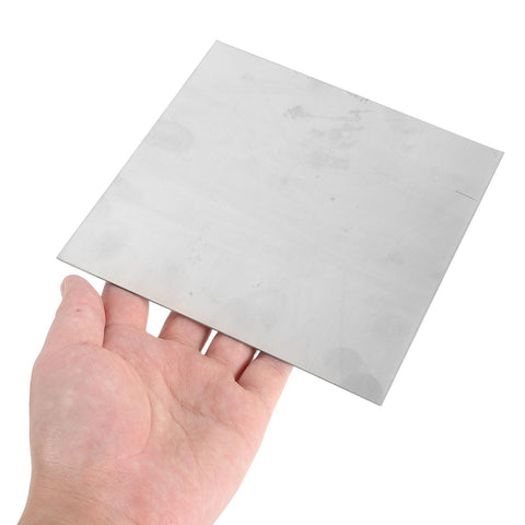 Top Shelf Stainless Steel Square Sheets 2 Pack 15X15X0.08Cm Sleek Mill Finish Solid Flat Stock held in hand.