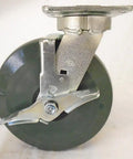 8 Inch Swivel Caster Kingpinless With Built In Wheel Brake And Non Marking Gray Polyurethane Wheel Hella Smooth For High Capacity Industrial Tool Carts viewed from side with brake engaged.