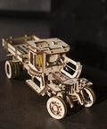 3D Self Propelled Wooden Model Truck UGM 11 Kit For Gearhead Builders And Collectors With Gear Driven Mechanism Realistic Wood Finish About 10 To 12 Hours Assembly Durable Brown Wood Craft Project That Feels Like Vintage Tech, front view