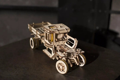 3D Self Propelled Wooden Model Truck UGM 11 Kit For Gearhead Builders And Collectors With Gear Driven Mechanism Realistic Wood Finish About 10 To 12 Hours Assembly Durable Brown Wood Craft Project That Feels Like Vintage Tech, front view