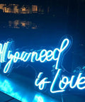 All You Need Is Love Neon Sign LED Light for Home Bar Party Decor with blue glow, customizable wall art, romantic wedding vibe, 60x26cm.