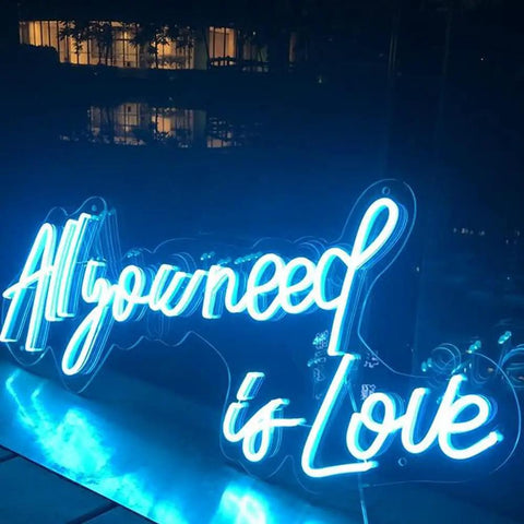 All You Need Is Love Neon Sign LED Light for Home Bar Party Decor with blue glow, customizable wall art, romantic wedding vibe, 60x26cm.