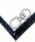 Heavy Duty Three Eighth Inch Eye And Eye Swivel For Marine Mooring And Boat Dock Rigging, galvanized steel, shown with ruler for size.