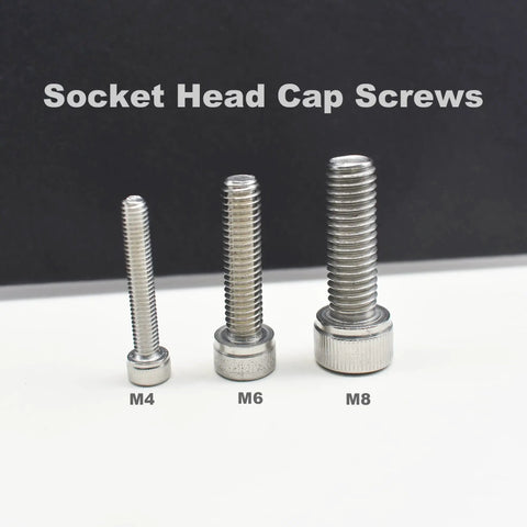M4, M6, and M8 stainless steel hex socket cap screws displayed on a white surface for comparison.
