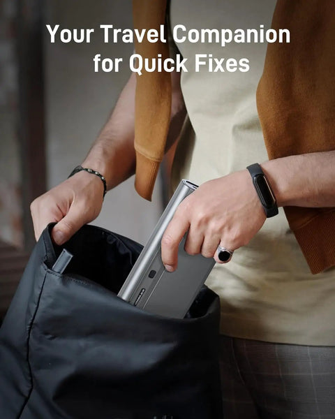 Person placing Rechargeable Electric Screwdriver With 32Bit Microprocessor And HD OLED Display into a black bag