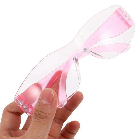 Heavy Hitting Splash Guard Safety Glasses Six Pack Tough As Nails Impact Resistant Work Eyewear Scratch Resistant Anti Fog Protective Goggles in hand with pink frames