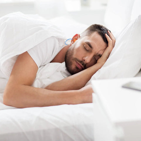 Man sleeping with All Day Comfort Corded Earplugs With 25dB NRR, Reusable Soft TPR Ear Plugs For Shooting Range Snoring Studying Construction And Manufacturing, Skin Friendly Fit, Easy In, Bright Orange.