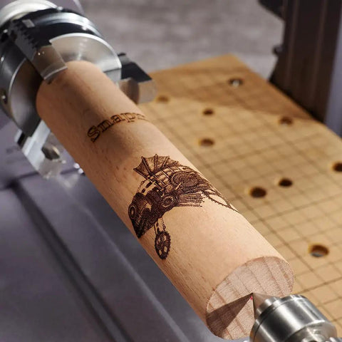 Next Level Rotary Module For Your Desktop Maker Machine Featuring Sweet 4 Axis Cnc Carving And Laser Engraving With Hella Precise Strain Wave Gearing And A Solid 3 Jaw Chuck Designed To Upgrade Any A350 Style 3D Printer Setup Today engraving on a wooden cylinder.