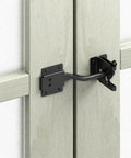 Heavy Duty Automatic Gate Latch Featuring Tough As Nails Self Actuating Mechanism And Secure Padlock Loop Built For Up To 144Mm Gates Straight Forward DIY Hookup Always Locked on a wooden gate.