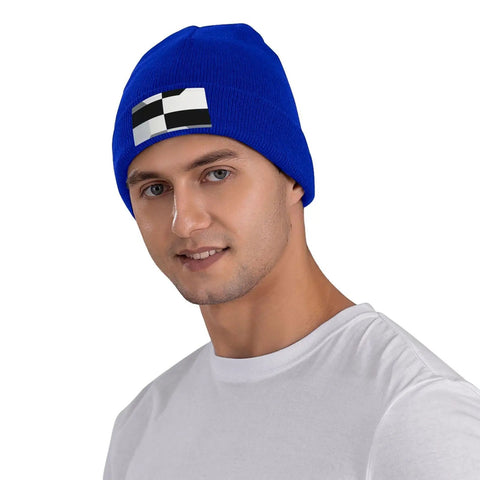 Kick Cold Weather To The Curb With This Straight Up Cozy Black And White Piano Plate Grid Knit Hat Crafted From Ultra Plush Acrylic Fiber For No Cap Winter Warmth Indoors Or Stepping Outside, blue knit beanie on model.
