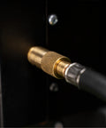 Close-up of brass connection on 3 Foot Propane Adapter Hose With Regulator For 20 Lb Tank, for Tabletop Griddles and Gas Grills.