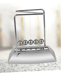 Z Shape Newton Cradle Pendulum Desk Toy For Home Office Decor with silver finish, 5-ball setup, on a marble surface