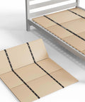 Solid Wood Bunkie Board 30X60 Inches Twin Bed Foundation displayed on a metal frame, showcasing its heavy-duty support design.