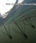 Underwater view of Five Pack Spider Sinkers For Surf Fishing Heavy Duty Lead Weights 1 To 8 Ounces with stainless steel wires