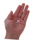 Hand holding a small white cross-shaped tile spacer for 500Pcs Tile Leveling Spacers Set Reusable Cross Shape Tile Alignment Tools For Quick Wall And Floor Tiling Durable 4mm Leveler Spacers For Easy No Fuss User Friendly Tiling Projects