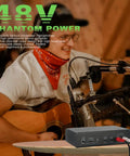 Guitarist using USB Audio Interface With 32 Bit 192 kHz Resolution XLR Mic And Line Inputs Phantom Power Direct Monitoring And Loopback