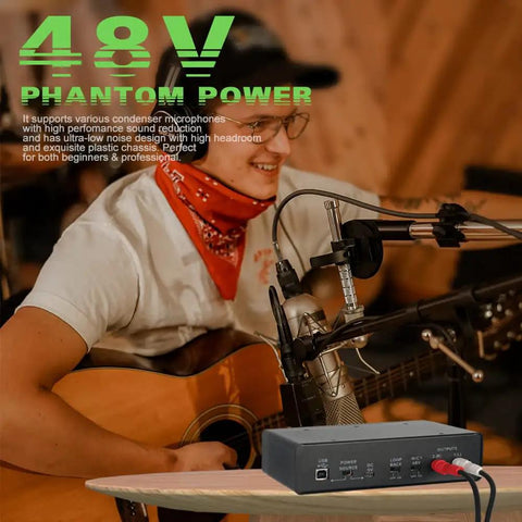 Guitarist using USB Audio Interface With 32 Bit 192 kHz Resolution XLR Mic And Line Inputs Phantom Power Direct Monitoring And Loopback