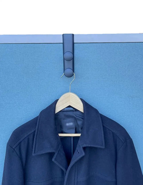 Over-The-Panel Cubicle Partition Wall Garment Hanger With Double Posts For 2.5 To 3 Inch Panels, Black, holding a jacket