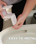 Hands installing Lid Lok Toilet Seat Safety Latch For Easy One Hand Lock White 1 Pack Tool Free Install on toilet.