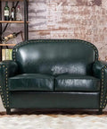 Tough As Nails Gold Metal Upholstery Tacks For Furniture Fixes And Slick Diy Upgrades 500 Pack Heavy Duty Brass Thumb Nails with rust-resistant coating on green leather sofa.