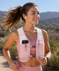 Woman running outdoors wearing Lightweight Running Hydration Vest For Men And Women With 6 Plus Pockets And Front Bottle Holders