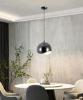 ZSJPDP American Industrial Style Metal Hanging Lamp, 8.2in, black metallic finish, suspended in a modern dining room.