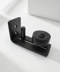 Heavy Duty Sliding Barn Door Floor Guide For Closets And Room Dividers Rock Solid Steel Runner Matte Black Finish side view of floor guide hardware.