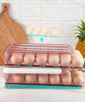 Clear Pink Egg Storage Bin For Fridge With Lid 2 Layer Stackable Egg Organizer 36 Count Dispenser Auto Rolling Egg Holder