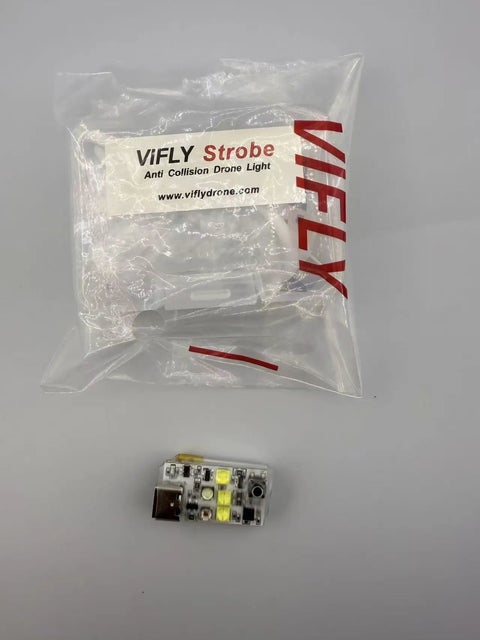 Drone Strobe Light Anti Collision Beacon For Night Flying With FAA Compliance next to packaging, 6g lightweight design