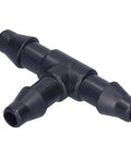 Close-up of black plastic Drip Irrigation Tee Connectors Kit for 4/7 Inch Hose, 100 Pack Garden Fittings, angled view