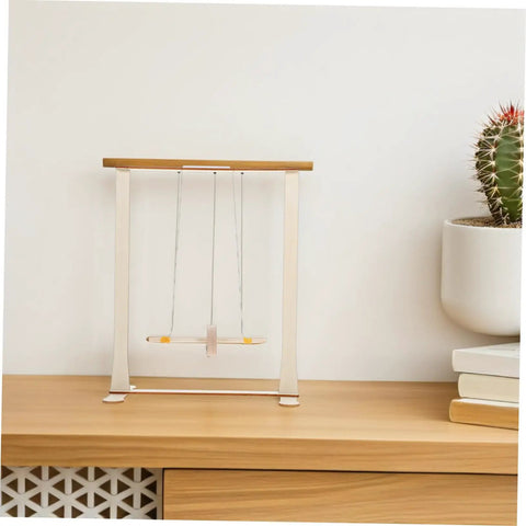 Educational Wooden Gravity Experiment Kit For Kids And Students displayed on a shelf, featuring an interactive Maxwell wheel.