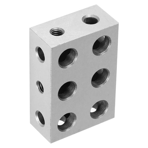 Front view of hardened steel 1-2-3 block with 11 holes for precision machinist setup.