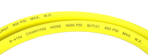 Close-up of yellow refrigeration charging hose with R-410A, 4000 PSI burst, and 800 PSI working pressure markings
