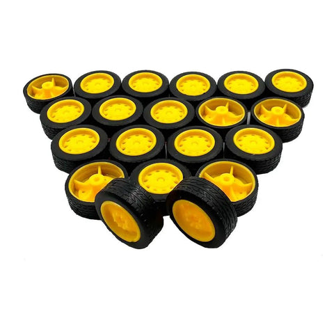 Dope Tiny Wheels Set For Hobby Builds 21mm Rubber Tires with yellow plastic hubs, arranged in a pyramid