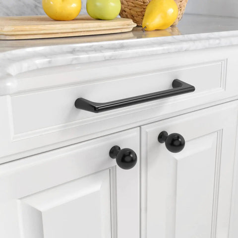Step Up Your Game With These 10 Pack 5 Inch Matte Black Cabinet Pulls Rocking A Slick Dark Finish Perfect For Heavy Duty Drawer Handles And Cupboards Lifetime Warranty Included on a white cabinet.