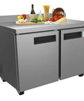 Built Tough 48 Inch Stainless Steel Commercial Worktop Freezer With Dual Doors And Sturdy Backsplash, preparing food on top.